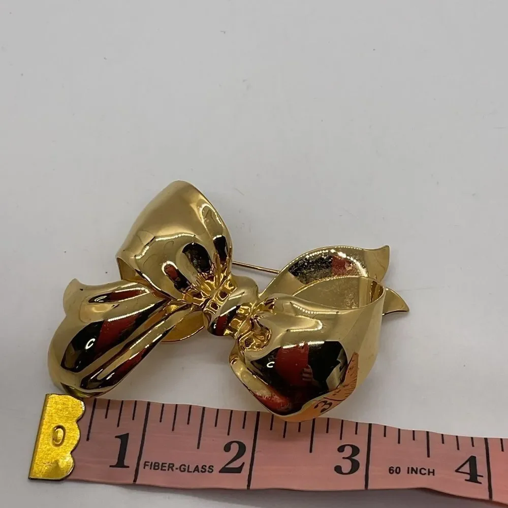 Monet Gold Toned Bow Brooch